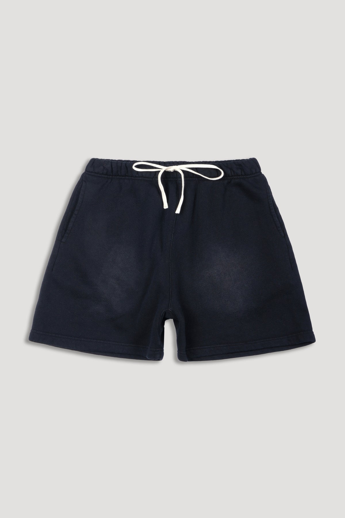 IYKYK Patched Oversized Sweat Short in Black Sun Fade