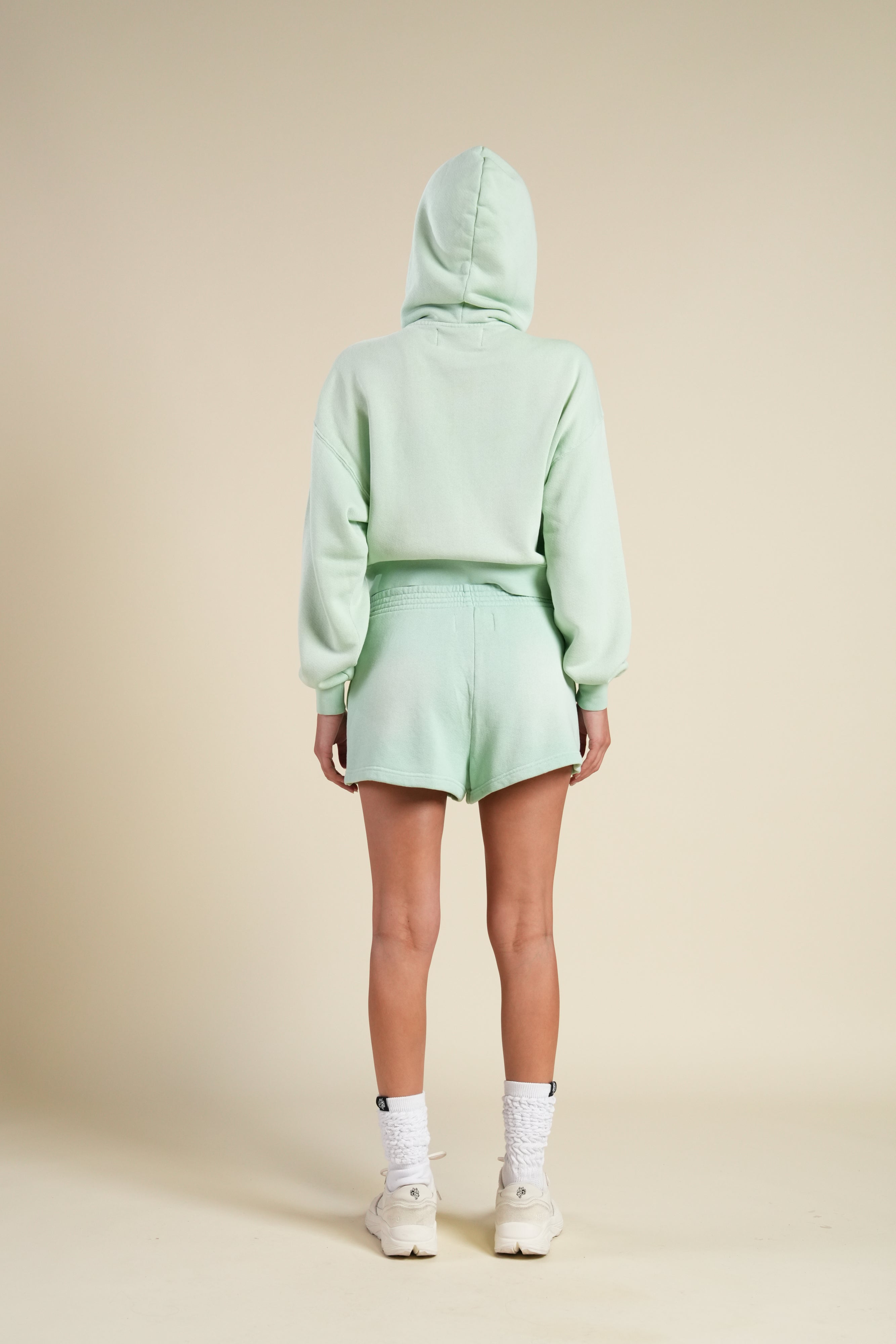 Cursive Wolves "Sage" Cropped Zip Hoodie in Honeydew Sun Fade