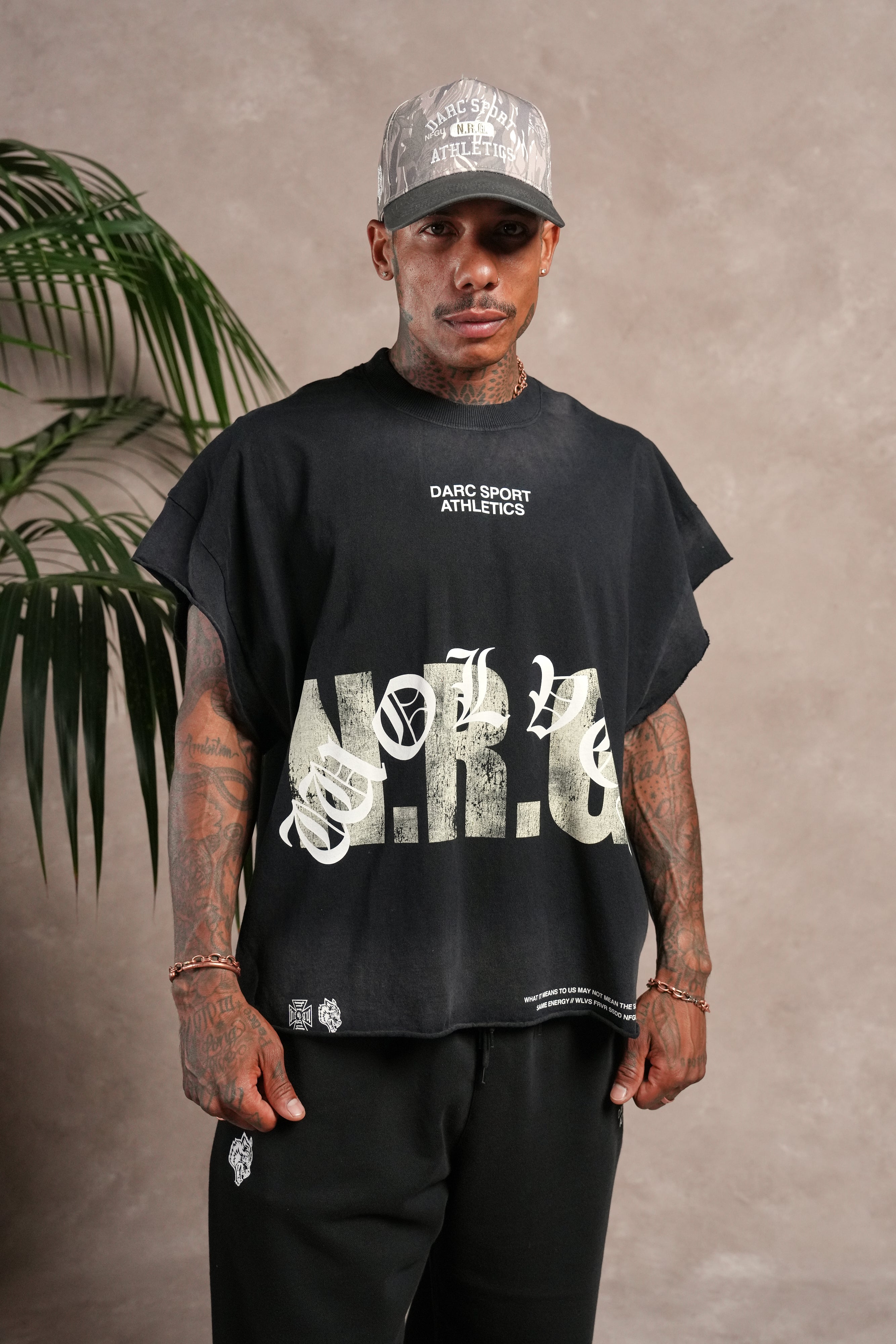 N.R.G. Grunge Cut-Off Mid Length Raw Hem Tee in Black Drift Wash