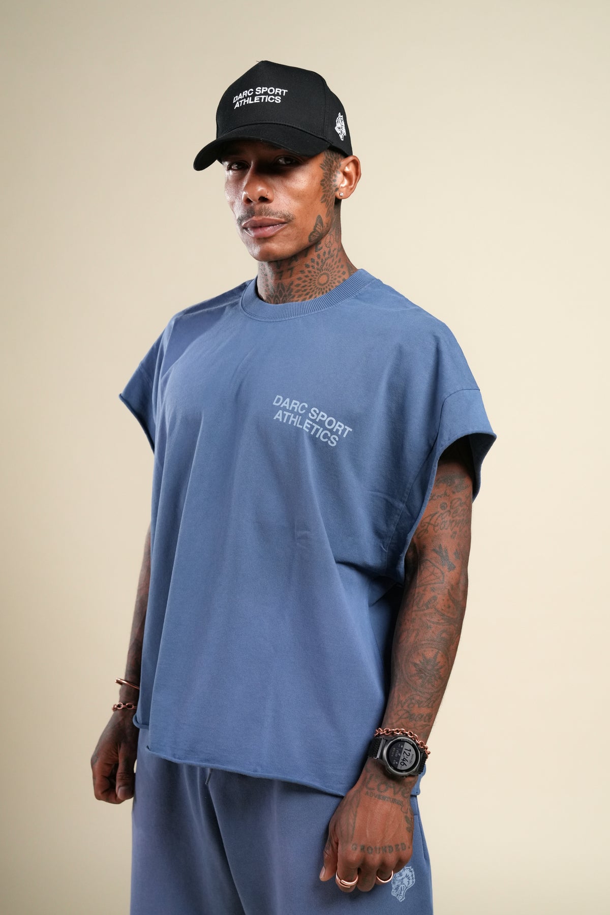 Darc Sport Athletics Grunge Cut-Off Tee in Washed Denim Sunfade