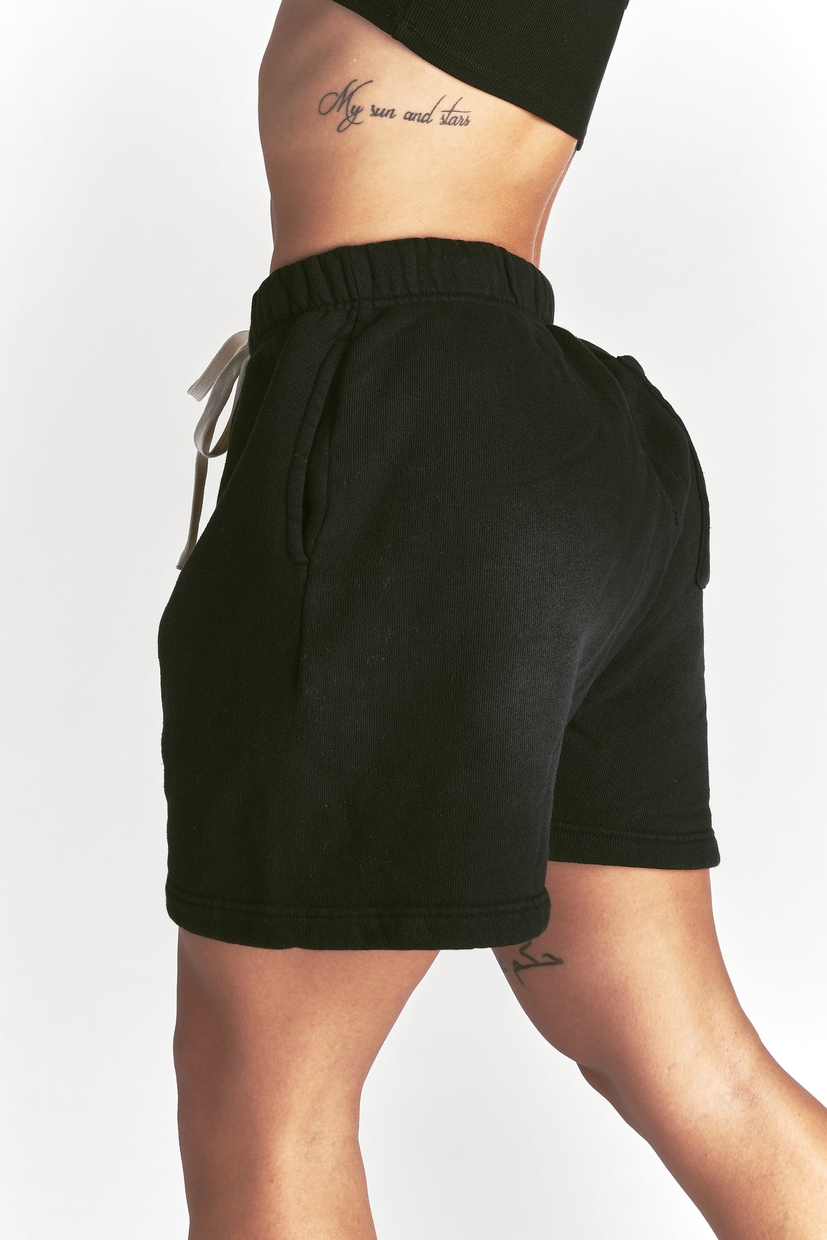 IYKYK Patched Oversized Sweat Short in Black Sun Fade