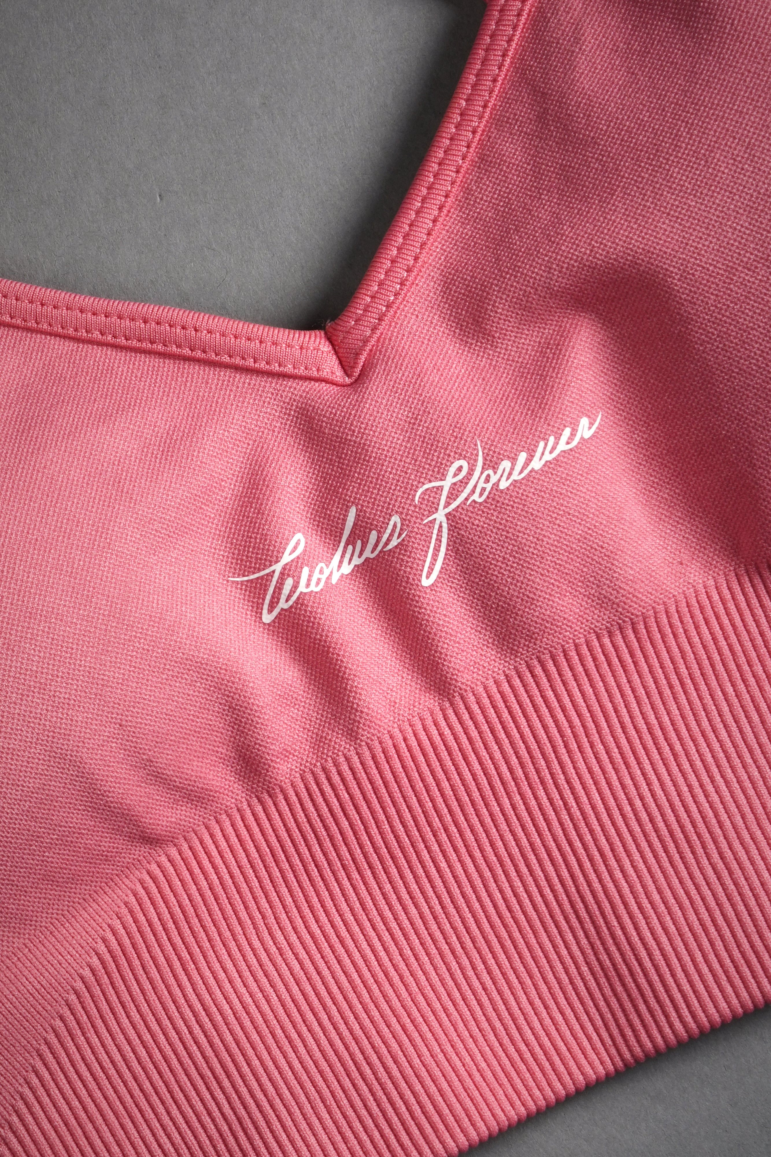 Wolves Forever "Everson Seamless" Sports Bra in Pink Ice