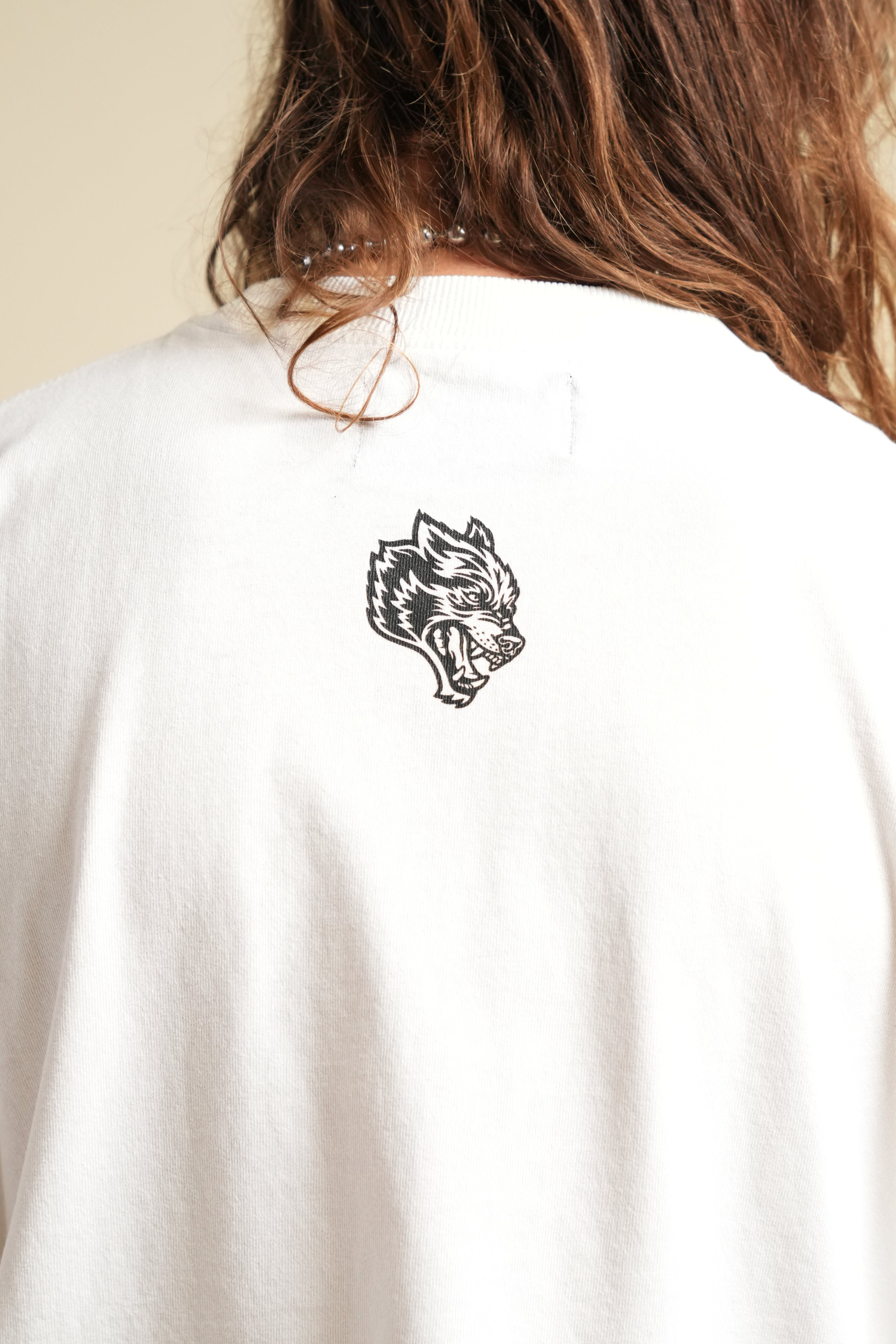 Ohana Wolves Club Grunge Raw Hem Mid Length Tee in Cream