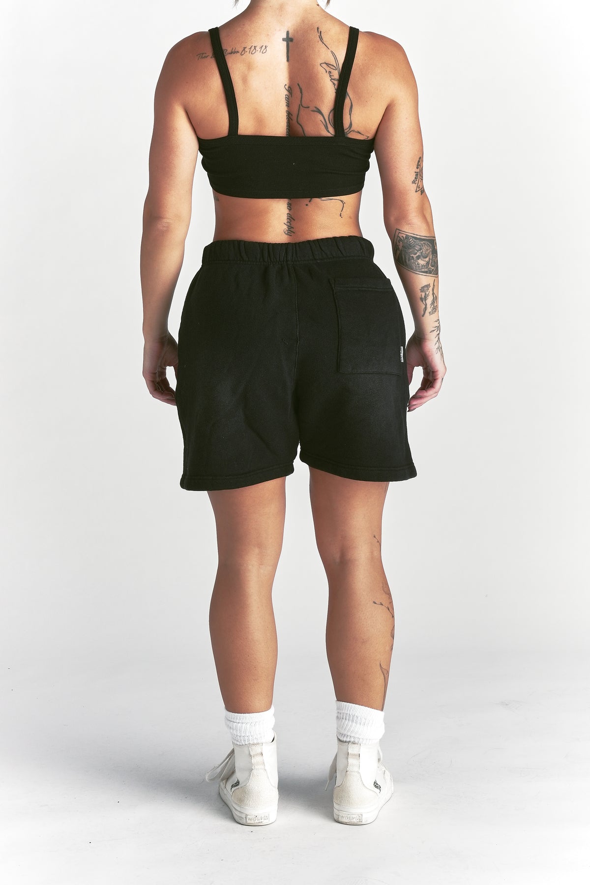 IYKYK Patched Oversized Sweat Short in Black Sun Fade