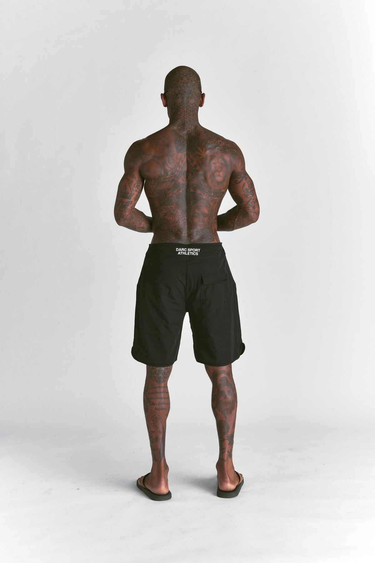 What We Rep Brucey's Board Shorts in Black