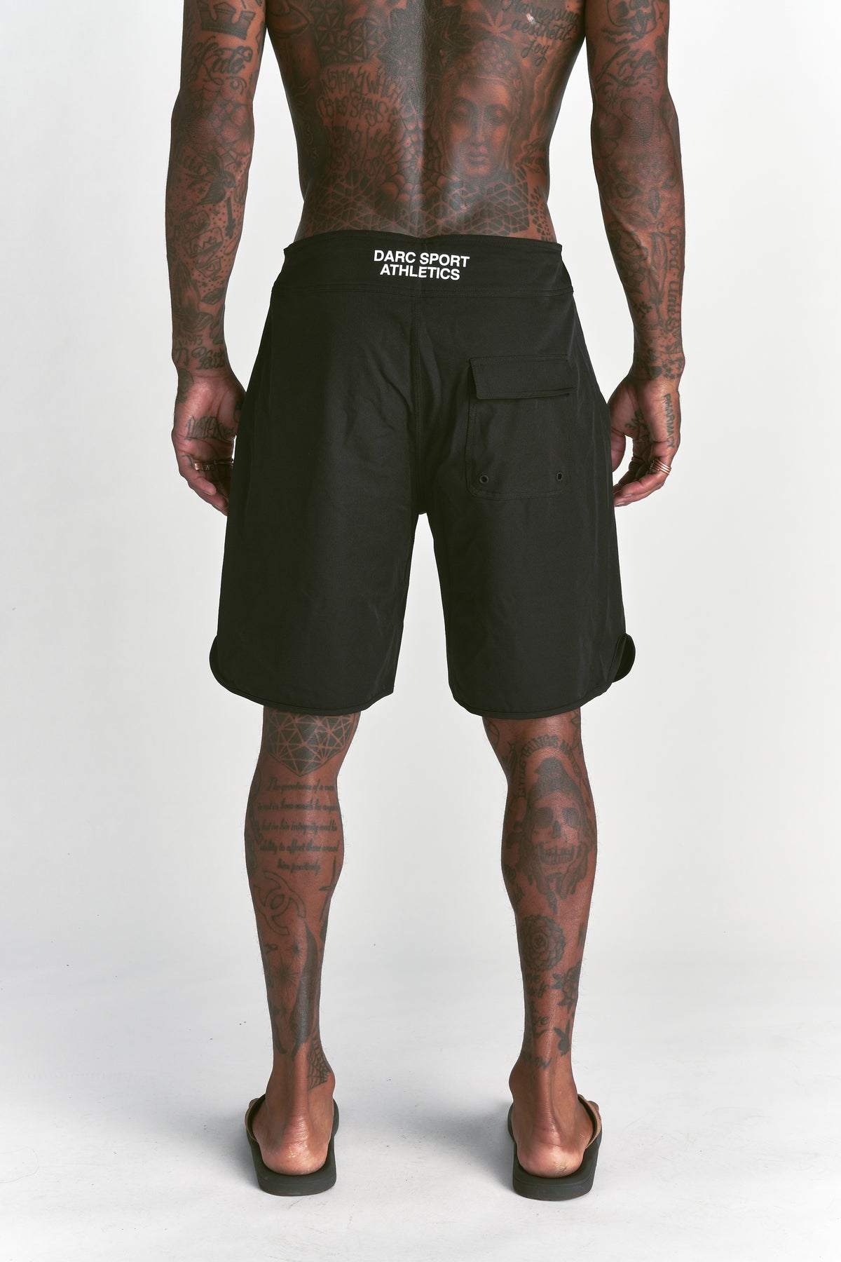What We Rep Brucey's Board Shorts in Black